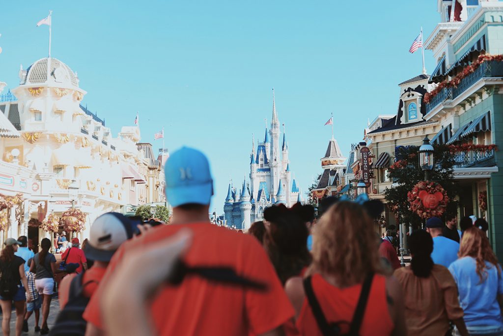Crowds walk down the Main Street in Orlando's Disney World.