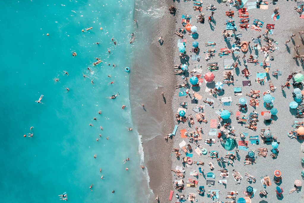 Overhead photo of beachgoers during spring break.