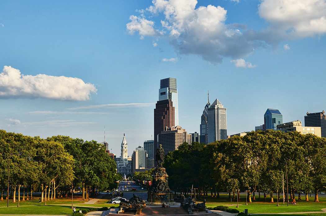 Photo of the Philadelphia skyline from a park outside of downtown.