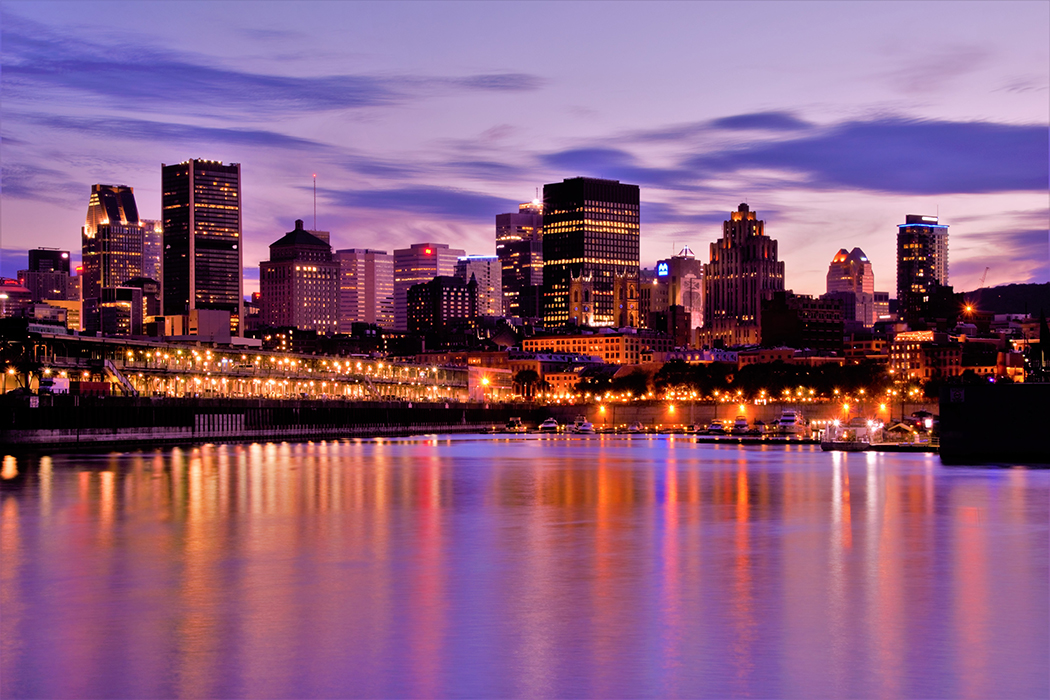 Photo of the Montreal skyline at sunset.