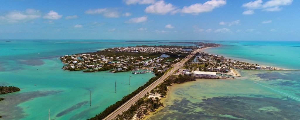 The Overseas Highway, or Route 1, pictured as it crosses over the ocean and into one of the Florida Keys