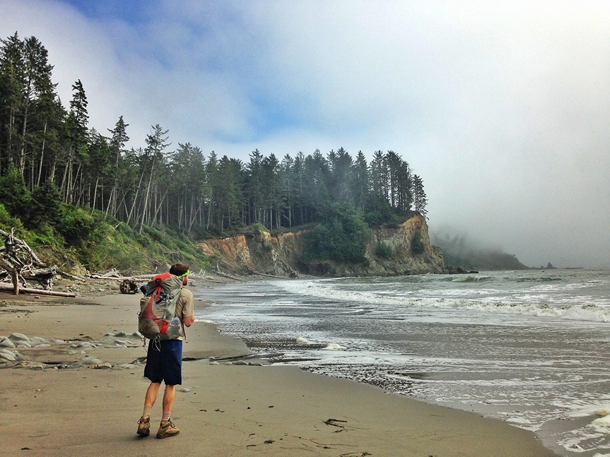 Hiker standing on Ruby Beach
