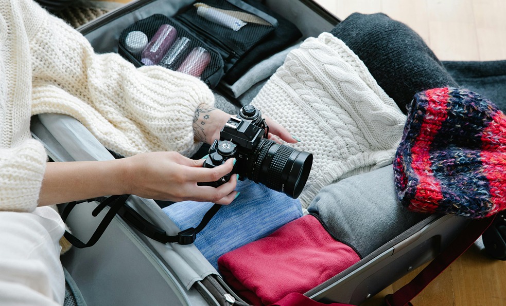A woman packing for her cheap bus trip to Boston - Wanderu