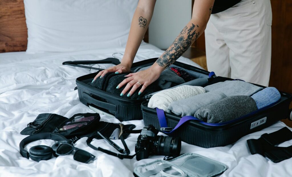 Rolling your clothes can make it easier to pack for your cheap bus journey - Wanderu