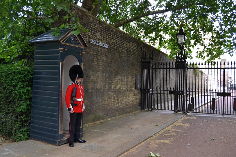 A royal guard stands outside of Clarence House, a royal residence near St James Palace