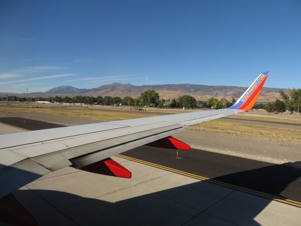 View from the inside of a plane as it takes off from the Reno airport
