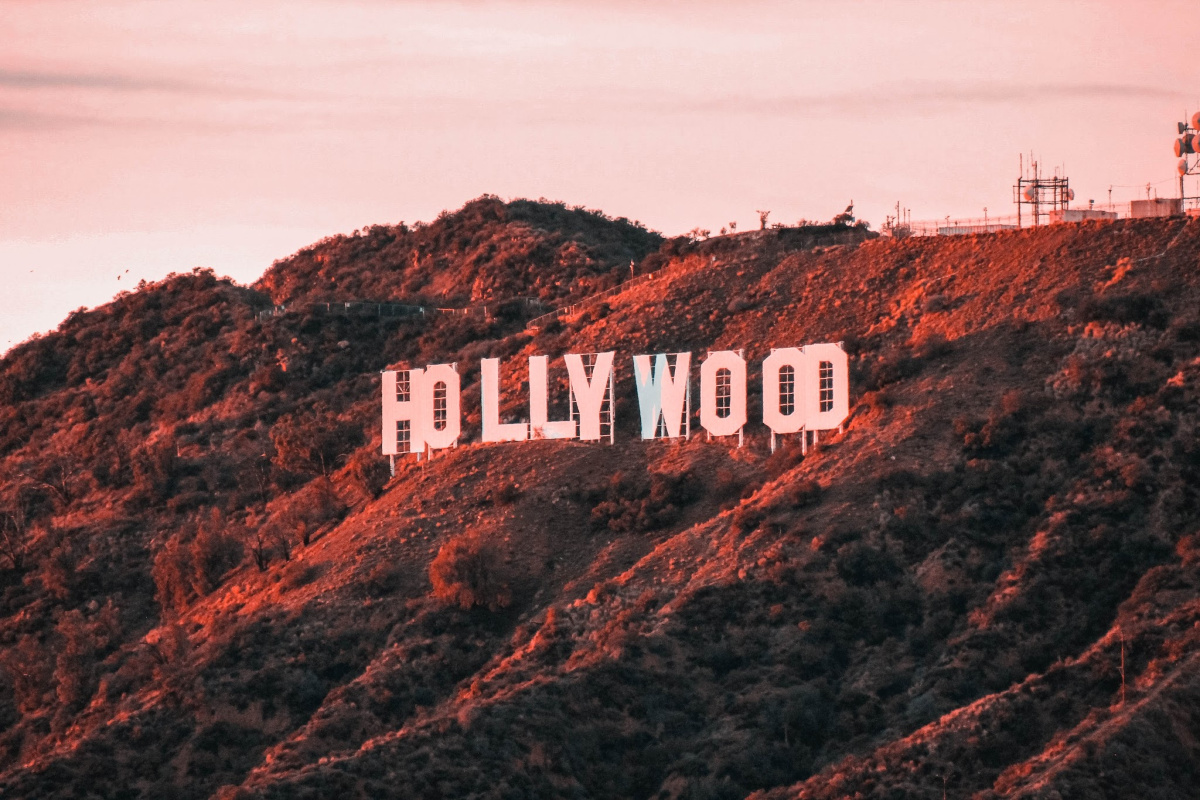 Photo of the Hollywood sign in Los Angeles at sunset.