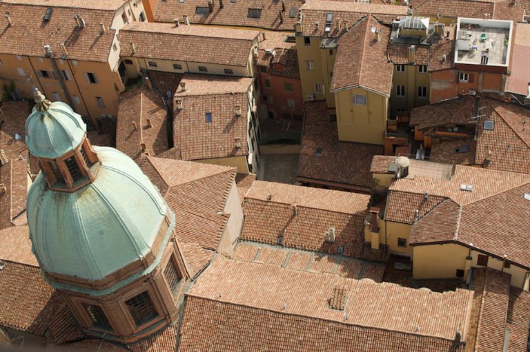 Overhead view of terra cotta roofs in Bologna.