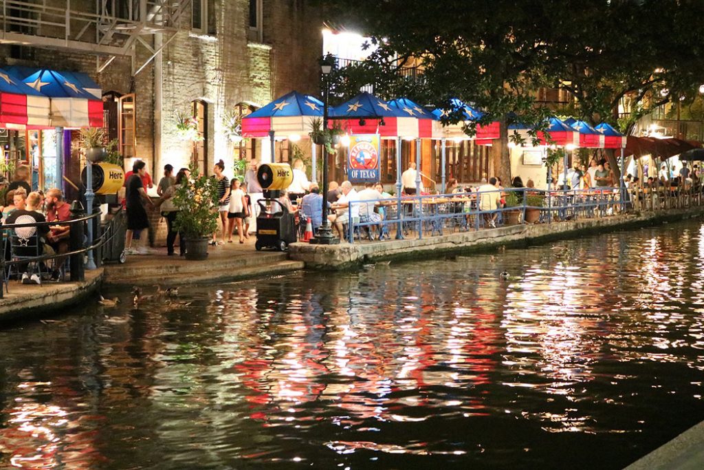 Photo of San Antonio's famous River Walk at night.
