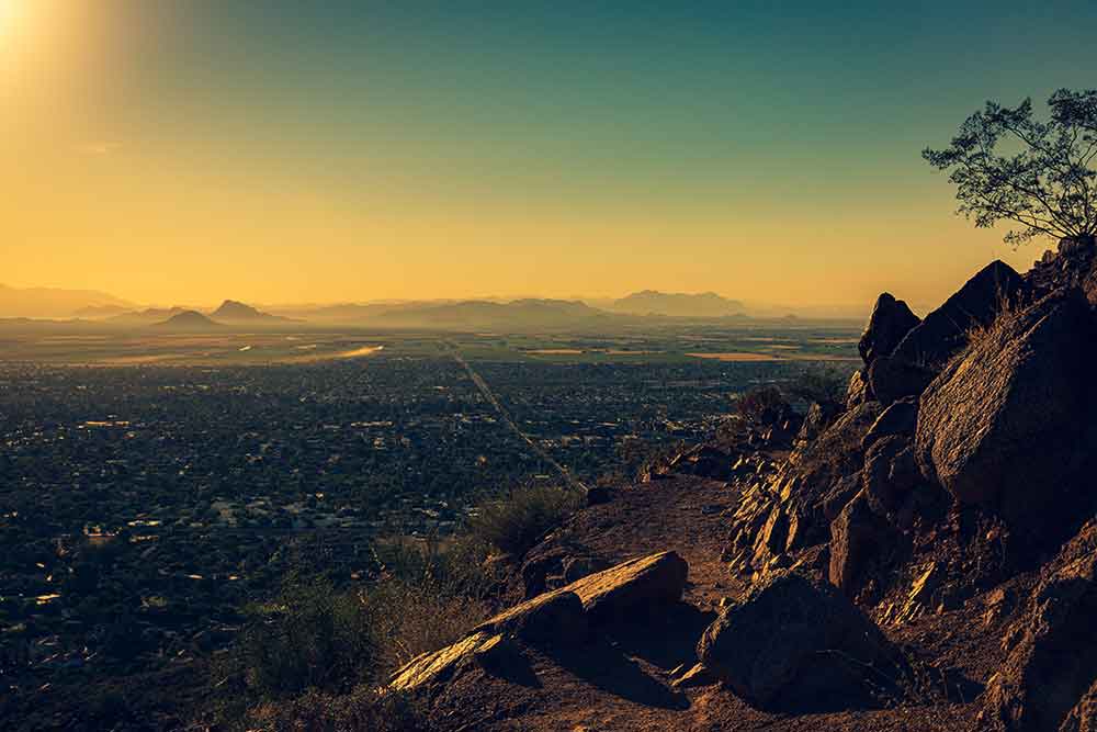 View of the sun rising atop Camelback Mountain in Phoenix.