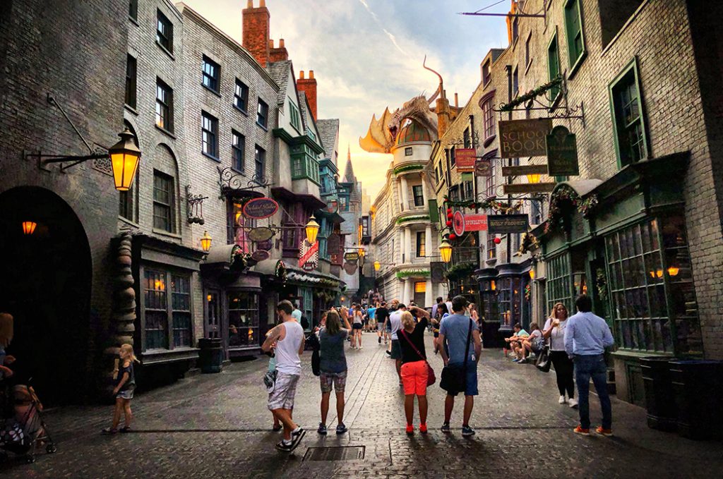 Photo of a family walking down Diagon Alley.