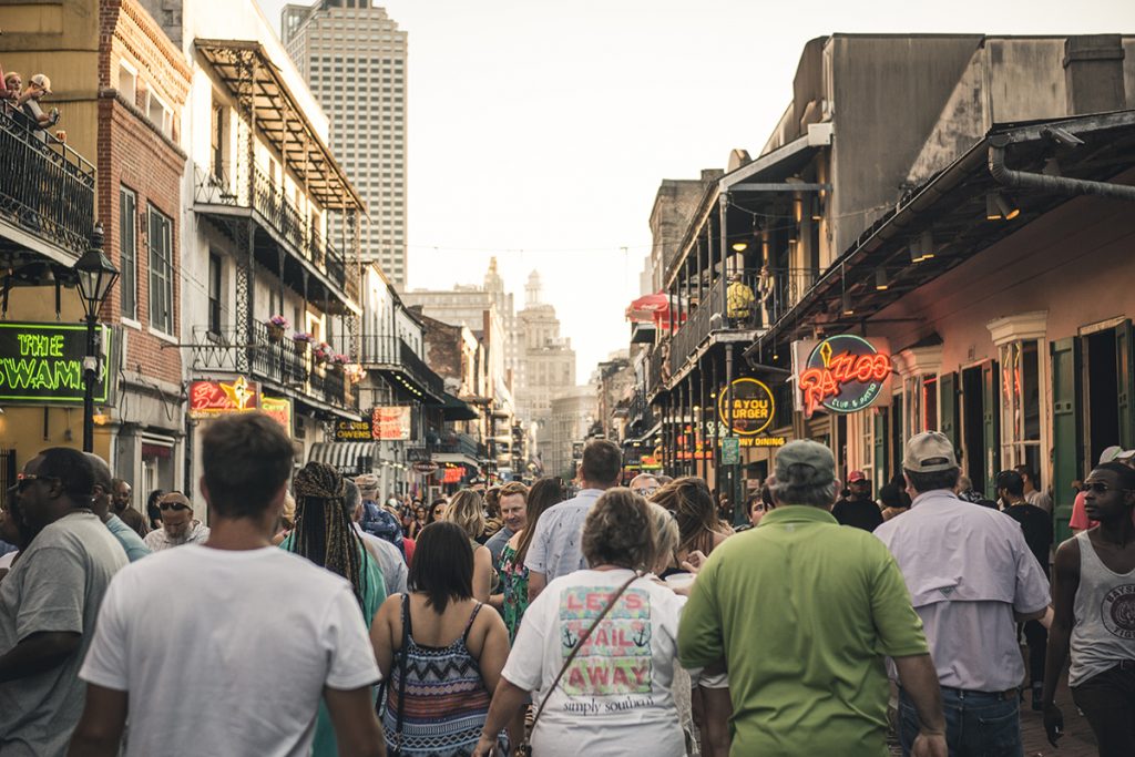 Photo of a busy Bourbon Street in New Orleans, LA.